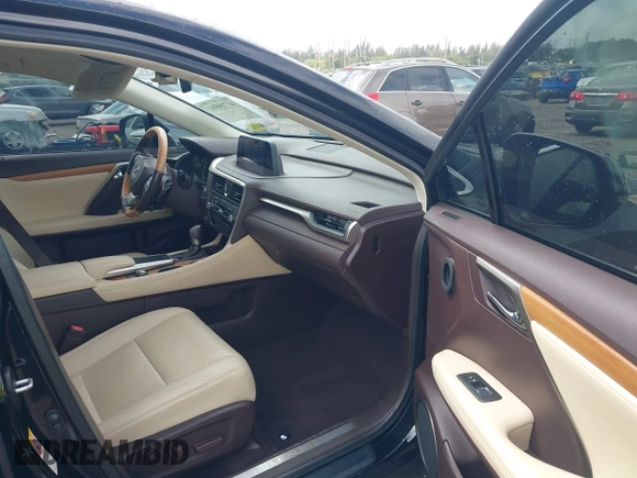 2020 Lexus RX 350 with VIN 2T2HZMAA9LC153571, listed as a IAAI auction lot 41710981 with 34,354 mi miles and . Bid and sale history available at DreamBid. Image 5.