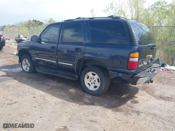 2004 Chevrolet Tahoe LT with VIN 1GNEC13Z84R209220, listed as a IAAI auction lot 41867643 with 385,229 mi miles. Bid and sale history available at carsss.com. Image 3.