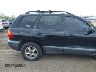 2004 Hyundai Santa Fe GLS with VIN KM8SC73D54U714336, listed as a IAAI auction lot 42079721 with 104,751 mi miles. Bid and sale history available at carsss.com. Image 14.