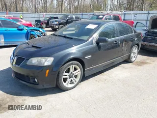 2009 Pontiac G8 with VIN 6G2ER57769L185606, listed as a IAAI auction lot 42112142 with 187,365 mi miles. Bid and sale history available at carsss.com. Image 2.