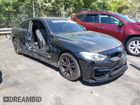 2015 BMW 4 Series 428i with VIN WBA3N7C54FK223490, listed as a IAAI auction lot 42033200 with 145,882 mi miles. Bid and sale history available at carsss.com. Image 1.