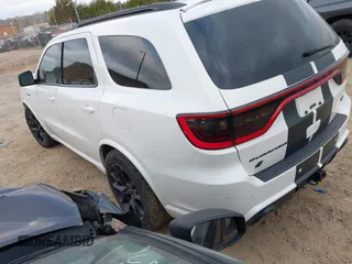 2021 Dodge Durango R/T with VIN 1C4SDJCT5MC549058, listed as a IAAI auction lot 41847281 with 99,556 mi miles and . Bid and sale history available at carsss.com. Image 3.
