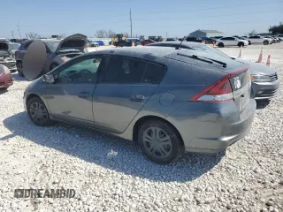 2012 Honda Insight z VIN JHMZE2H37CS002872, wystawiony jako Copart lot #48338685 z przebiegiem Nie podano mil oraz Szkoda całkowita • Salvage title. Historia ofert i sprzedaży dostępna na DreamBid. Obrazek 2.