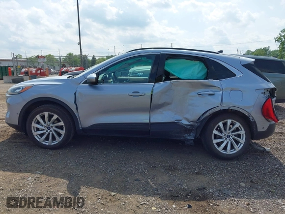 2022 Ford Escape Titanium with VIN 1FMCU9J94NUB57495, listed as a IAAI auction lot 42530044 with 27,075 mi miles and . Bid and sale history available at DreamBid. Image 14.