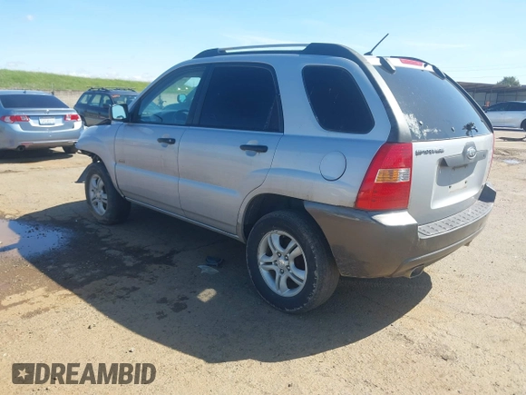 2006 Kia Sportage LX with VIN KNDJE723467202880, listed as a IAAI auction lot 41828141 with 263,068 mi miles and . Bid and sale history available at DreamBid. Image 3.