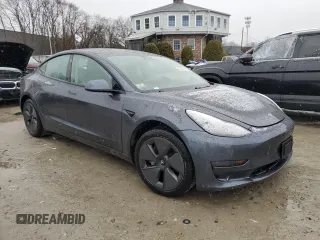 2021 Tesla Model 3 Standard Range Plus with VIN 5YJ3E1EA0MF907358, listed as a Copart auction lot 82103164 with 37,529 mi miles and Salvage Title. Bid and sale history available at DreamBid. Image 4.