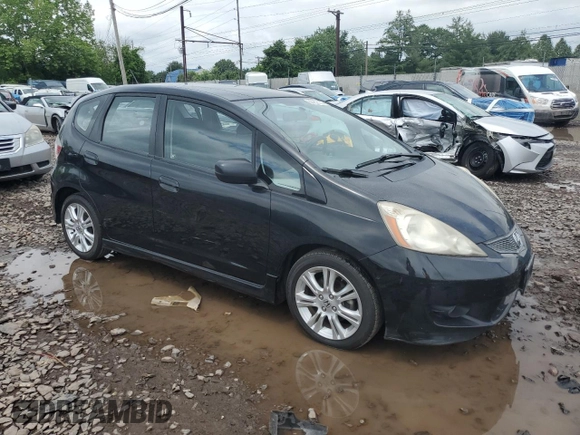 2010 Honda Fit Sport with VIN JHMGE8H48AC002535, listed as a Copart auction lot 60959135 with 136,990 mi miles and Salvage title. Bid and sale history available at DreamBid. Image 4.