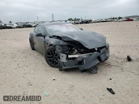 2023 Tesla Model S z VIN 5YJSA1E58PF531166, wystawiony jako Copart lot #51827565 z przebiegiem Nie podano mil oraz Szkoda całkowita • Salvage title. Historia ofert i sprzedaży dostępna na DreamBid. Obrazek 10.
