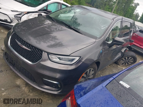 2023 Chrysler Pacifica Hybrid Touring L with VIN 2C4RC1L72PR540902, listed as a IAAI auction lot 42151047 with Not Provided miles and . Bid and sale history available at DreamBid. Image 2.