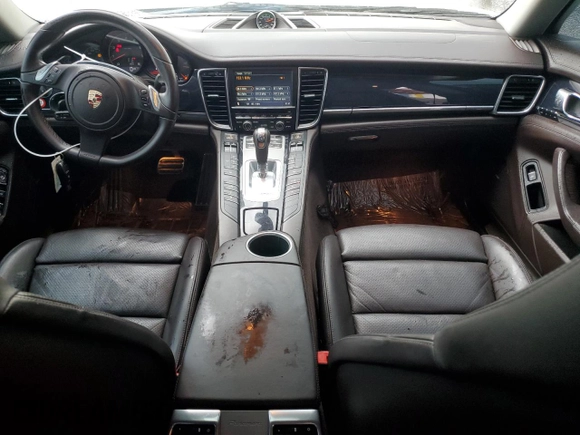 2012 Porsche Panamera z VIN WP0AA2A75CL071366, wystawiony jako Copart lot #59870805 z przebiegiem 126 489 mil mil oraz Szkoda całkowita • Salvage title. Historia ofert i sprzedaży dostępna na DreamBid. Obrazek 8.