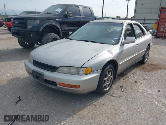 1996 Honda Accord Value with VIN 1HGCD5690TA212711, listed as a IAAI auction lot 42035289 with 184,592 mi miles and . Bid and sale history available at carsss.com. Image 2.