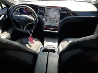 2016 Tesla Model S 90D with VIN 5YJSA1E22GF177120, listed as a Copart auction lot 51972885 with 73,441 mi miles and Salvage title. Bid and sale history available at DreamBid. Image 8.