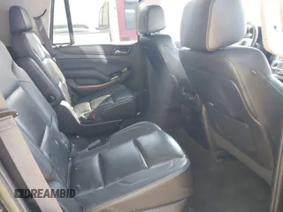 2015 Chevrolet Tahoe LTZ z VIN 1GNSKCKC8FR141163, wystawiony jako IAAI lot #42114008 z przebiegiem 221 804 mil mil oraz . Historia ofert i sprzedaży dostępna na DreamBid. Obrazek 8.