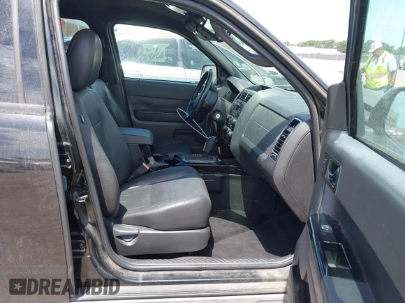 2011 Ford Escape Limited with VIN 1FMCU0EG9BKC66966, listed as a IAAI auction lot 42627832 with 154,101 mi miles and . Bid and sale history available at DreamBid. Image 5.
