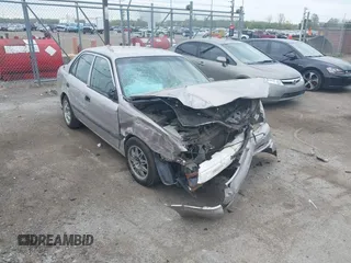 1999 Chevrolet Prizm z VIN 1Y1SK5280XZ445777, wystawiony jako IAAI lot #42138329 z przebiegiem 228 719 mil mil oraz . Historia ofert i sprzedaży dostępna na DreamBid. Obrazek 1.