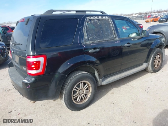 2010 Ford Escape XLT with VIN 1FMCU0DG5AKD45566, listed as a IAAI auction lot 41232118 with 166,816 mi miles. Bid and sale history available at carsss.com. Image 4.