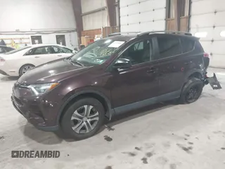 2018 Toyota RAV4 LE with VIN 2T3BFREV0JW759714, listed as a IAAI auction lot 41823084 with 119,909 mi miles and . Bid and sale history available at DreamBid. Image 21.