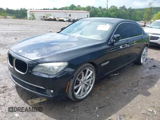 2011 BMW 7 Series 740Li with VIN WBAKB4C5XBC392890, listed as a IAAI auction lot 42108817 with 162,874 mi miles. Bid and sale history available at carsss.com. Image 2.