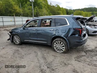 2020 Cadillac XT6 AWD Premium Luxury with VIN 1GYKPFRS1LZ148342, listed as a Copart auction lot 73495264 with 100,702 mi miles and Salvage Title. Bid and sale history available at carsss.com. Image 2.