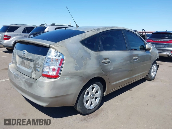 2007 Toyota Prius with VIN JTDKB20U977619909, listed as a IAAI auction lot 41829445 with 113,136 mi miles and . Bid and sale history available at carsss.com. Image 4.