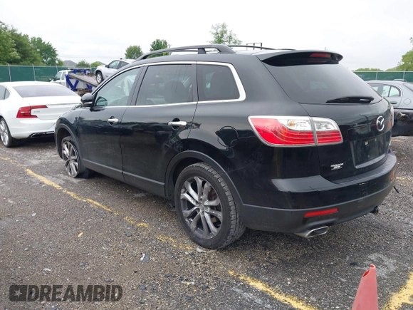2012 Mazda CX-9 Grand Touring z VIN JM3TB2DAXC0338667, wystawiony jako IAAI lot #42260820 z przebiegiem 138 111 mil mil oraz . Historia ofert i sprzedaży dostępna na DreamBid. Obrazek 3.