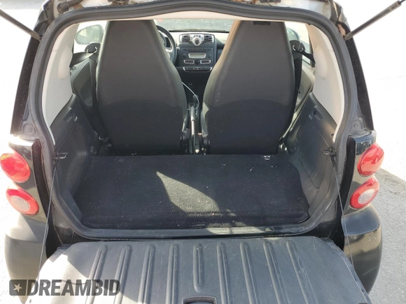 2009 Smart fortwo Pure z VIN WMEEJ31X39K211342, wystawiony jako Copart lot #54104045 z przebiegiem 46 162 mil mil oraz Tytuł czysty. Historia ofert i sprzedaży dostępna na DreamBid. Obrazek 10.
