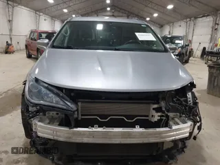 2017 Chrysler Pacifica Touring L with VIN 2C4RC1BG7HR831320, listed as a IAAI auction lot 41805697 with 137,743 mi miles and . Bid and sale history available at DreamBid. Image 12.