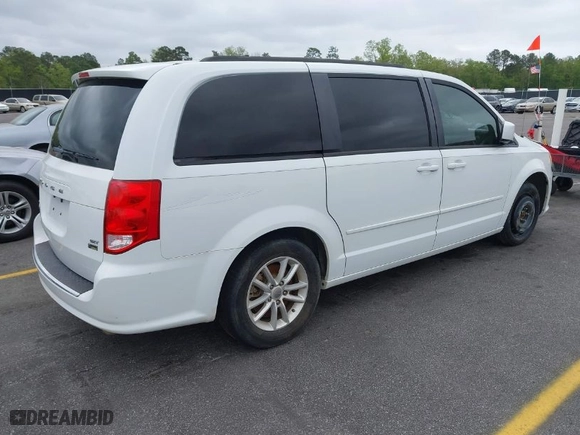 2014 Dodge Grand Caravan SXT with VIN 2C4RDGCG0ER390849, listed as a IAAI auction lot 41957368 with 98,044 mi miles. Bid and sale history available at carsss.com. Image 4.