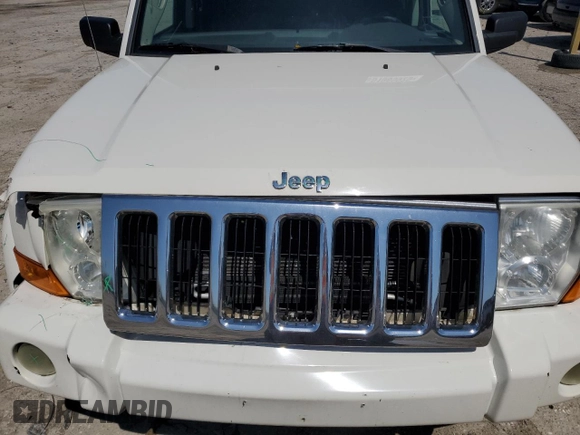 2010 Jeep Commander Sport with VIN 1J4RG4GKXAC121954, listed as a Copart auction lot 51965925 with 144,115 mi miles and Salvage title. Bid and sale history available at DreamBid. Image 12.