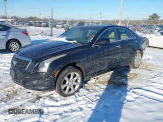 2014 Cadillac ATS Standard AWD with VIN 1G6AG5RX1E0170228, listed as a IAAI auction lot 41629063 with 89,568 mi miles and . Bid and sale history available at DreamBid. Image 2.