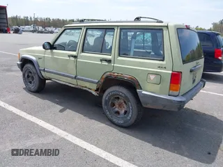 1998 Jeep Cherokee Sport with VIN 1J4FJ68SXWL264165, listed as a IAAI auction lot 42168443 with 244,828 mi miles and . Bid and sale history available at DreamBid. Image 3.