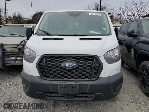 2023 Ford Transit Cargo with VIN 1FTBR1Y88PKA97221, listed as a Copart auction lot 43410475 with 34,927 mi miles and Salvage Title. Bid and sale history available at DreamBid. Image 5.