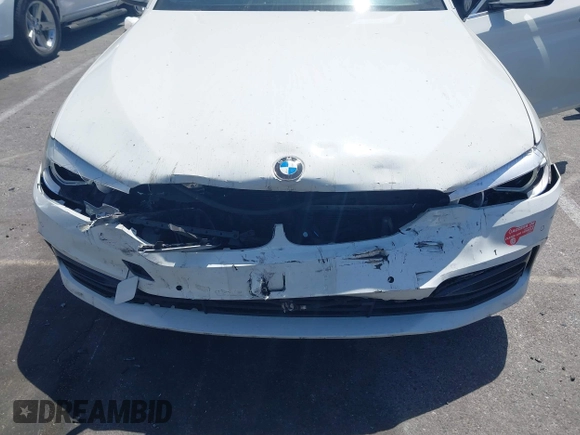 2018 BMW 5 Series 530e with VIN WBAJA9C58JB252868, listed as a IAAI auction lot 42323949 with 100,530 mi miles and . Bid and sale history available at DreamBid. Image 6.