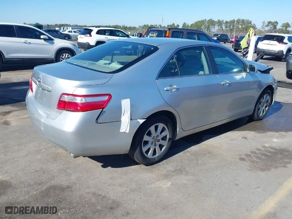 2007 Toyota Camry CE with VIN JTNBE46K973037322, listed as a IAAI auction lot 41461438 with 153,723 mi miles. Bid and sale history available at carsss.com. Image 4.