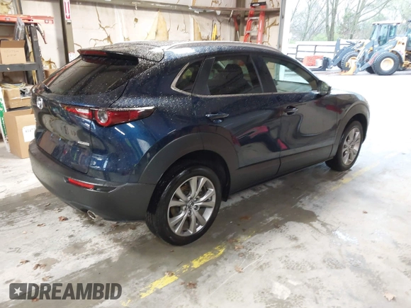 2022 Mazda CX-30 S Select z VIN 3MVDMBBL0NM440747, wystawiony jako IAAI lot #41864038 z przebiegiem 9667 mil mil oraz . Historia ofert i sprzedaży dostępna na DreamBid. Obrazek 4.