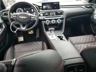 2023 Genesis G70 3.3T with VIN KMTG54TE1PU106024, listed as a Copart auction lot 70501604 with 24,470 mi miles and Salvage Title. Bid and sale history available at DreamBid. Image 8.