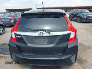2015 Honda Fit EX-L z VIN 3HGGK5H81FM723962, wystawiony jako IAAI lot #42455367 z przebiegiem 104 859 mil mil oraz . Historia ofert i sprzedaży dostępna na DreamBid. Obrazek 16.