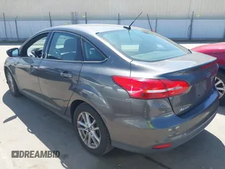 2017 Ford Focus SE z VIN 1FADP3F26HL308880, wystawiony jako IAAI lot #41991909 z przebiegiem 103 403 mil mil oraz . Historia ofert i sprzedaży dostępna na DreamBid. Obrazek 3.