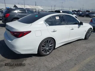 2019 Infiniti Q50 Luxe with VIN JN1EV7APXKM513850, listed as a IAAI auction lot 41689080 with 85,520 mi miles and . Bid and sale history available at DreamBid. Image 4.