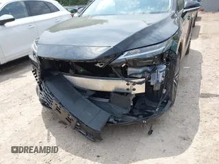 2023 Lexus RX 350 with VIN 2T2BAMCA6PC021707, listed as a IAAI auction lot 42487717 with 30,008 mi miles and . Bid and sale history available at DreamBid. Image 6.