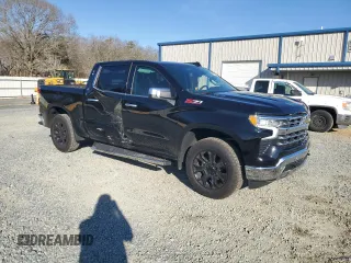 2023 Chevrolet Silverado 1500 LTZ with VIN 1GCUDGE85PZ163021, listed as a Copart auction lot 43059445 with 28,719 mi miles and Salvage Title. Bid and sale history available at carsss.com. Image 4.