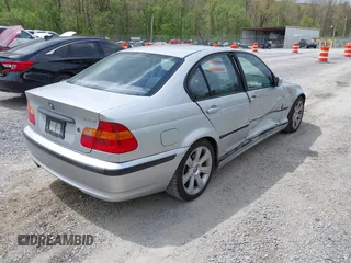 2003 BMW 3 Series 325i with VIN WBAEV33403KL79160, listed as a IAAI auction lot 42123846 with 200,406 mi miles and . Bid and sale history available at DreamBid. Image 4.