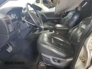 2002 Jeep Grand Cherokee Limited z VIN 1J8GW58S02C279251, wystawiony jako Copart lot #61563465 z przebiegiem 182 244 mil mil oraz Szkoda całkowita • Salvage title. Historia ofert i sprzedaży dostępna na DreamBid. Obrazek 7.