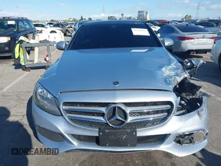 2018 Mercedes-Benz C 300 with VIN 55SWF4JB1JU244077, listed as a IAAI auction lot 41795613 with 90,900 mi miles and . Bid and sale history available at DreamBid. Image 12.