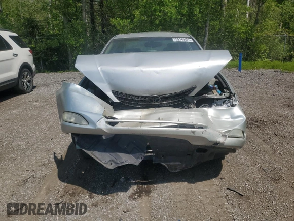 2004 Toyota Camry LE z VIN 4T1BE30K64U887305, wystawiony jako Copart lot #59349925 z przebiegiem 291 527 mil mil oraz Szkoda całkowita • Salvage title. Historia ofert i sprzedaży dostępna na DreamBid. Obrazek 5.