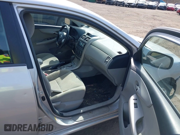 2012 Toyota Corolla L with VIN 2T1BU4EE7CC842871, listed as a IAAI auction lot 41782205 with 213,186 mi miles. Bid and sale history available at carsss.com. Image 5.