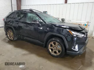 2024 Toyota RAV4 Hybrid LE with VIN 2T3UWRFV4RW201948, listed as a Copart auction lot 70400424 with 6,852 mi miles and Salvage title. Bid and sale history available at DreamBid. Image 4.