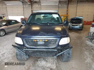 2001 Ford F-150 with VIN 1FTZF182X1KA13166, listed as a IAAI auction lot 42513979 with 197,994 mi miles and . Bid and sale history available at DreamBid. Image 6.
