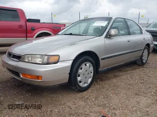 1997 Honda Accord LX with VIN JHMCD5638VC000719, listed as a IAAI auction lot 42190141 with 325,010 mi miles and . Bid and sale history available at carsss.com. Image 2.
