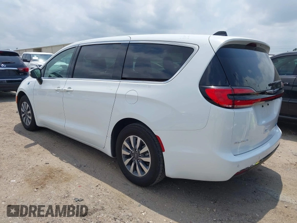 2023 Chrysler Pacifica Hybrid Touring L z VIN 2C4RC1L76PR618422, wystawiony jako IAAI lot #42289283 z przebiegiem 40 744 mil mil oraz . Historia ofert i sprzedaży dostępna na DreamBid. Obrazek 3.